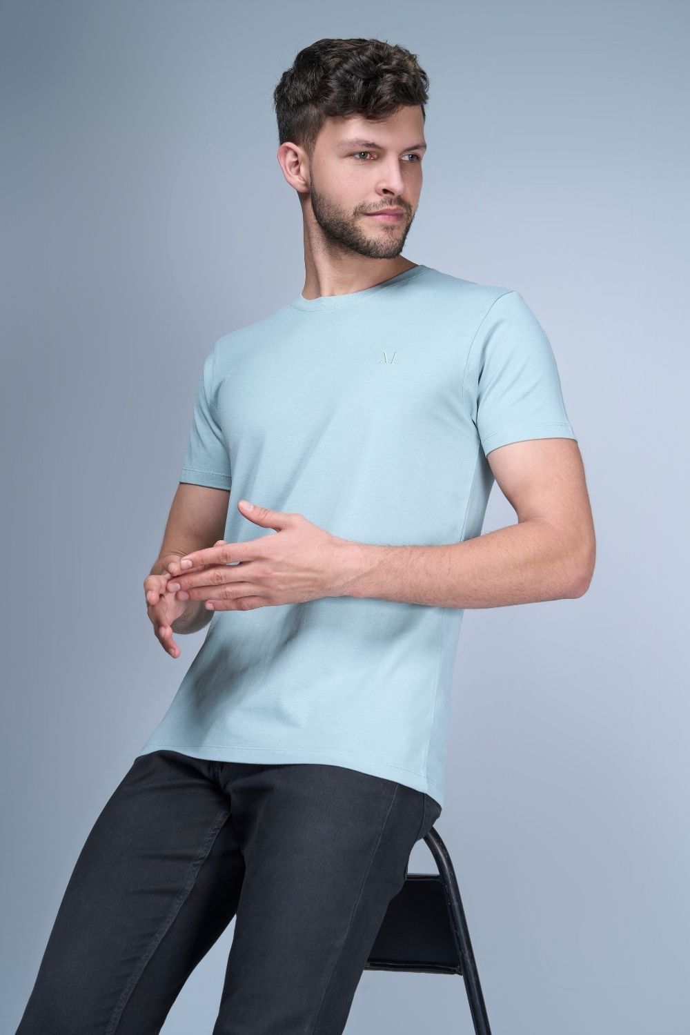 Shanghai blue colored, Solid T shirt for men, with half sleeves and round neck.