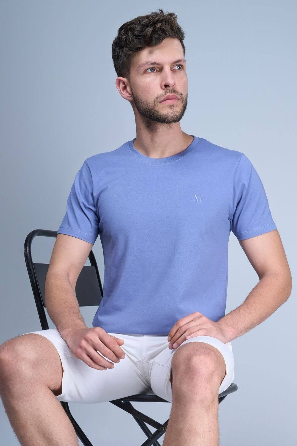 Blue colored, cotton solid T shirt for men with half sleeves and round neck.