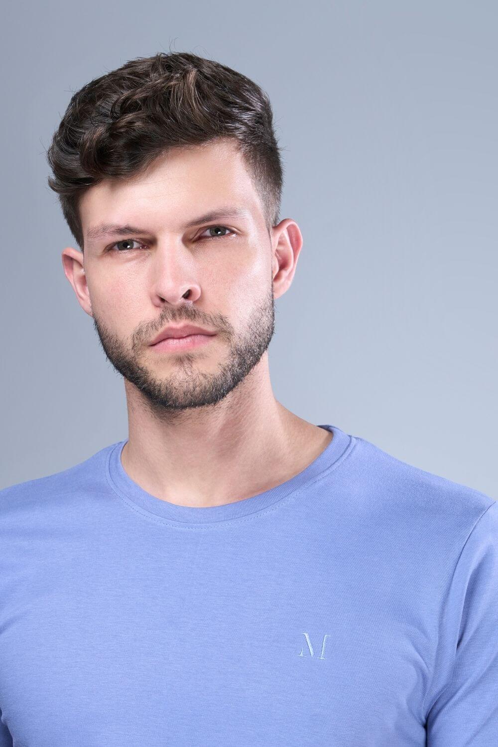Blue colored, cotton solid T shirt for men with half sleeves and round neck from vibgyor series collection, close up view.