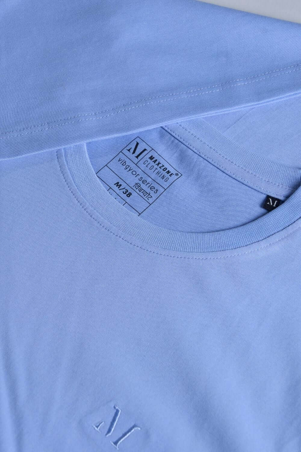 Close up of Blue colored, cotton solid T shirt for men with half sleeves and round neck from vibgyor series collection.
