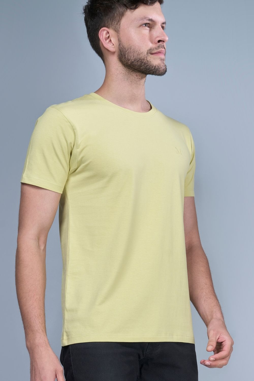 Lemon green colored, Solid T shirt for men, with half sleeves and round neck, side view.