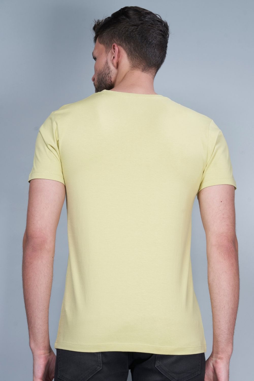Lemon green colored, Solid T shirt for men, with half sleeves and round neck, back view.