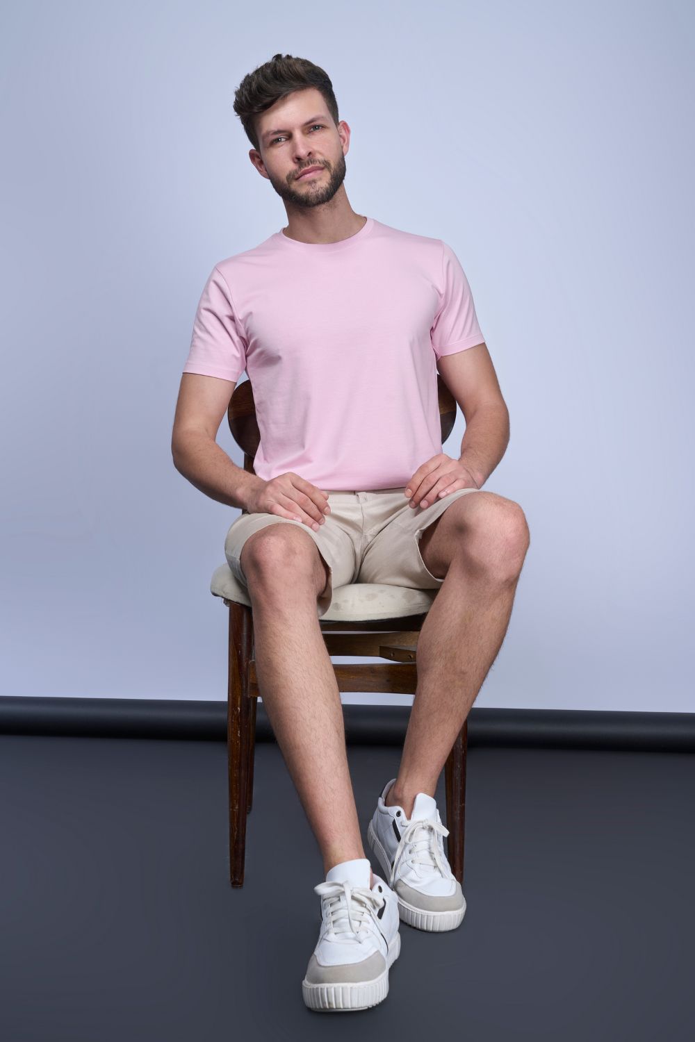 Cotton oversized T shirt for men in the solid color Café cream with half sleeves and crew neck, front view.
