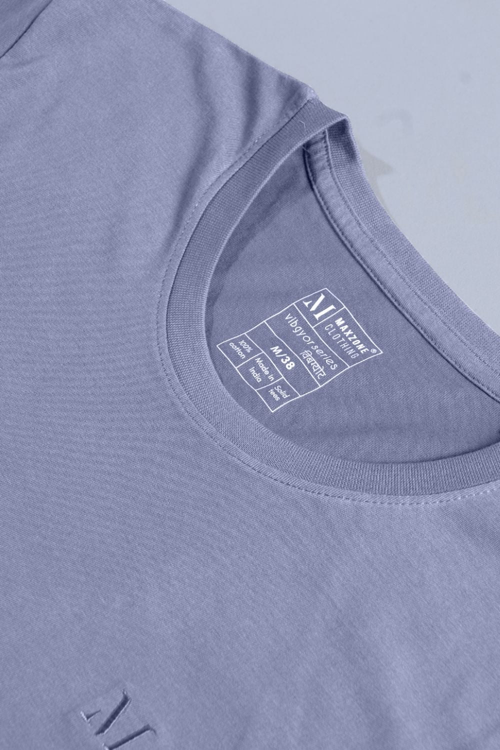 Vista Blue colored, solid t shirt for men with round neck and half sleeves product close up.