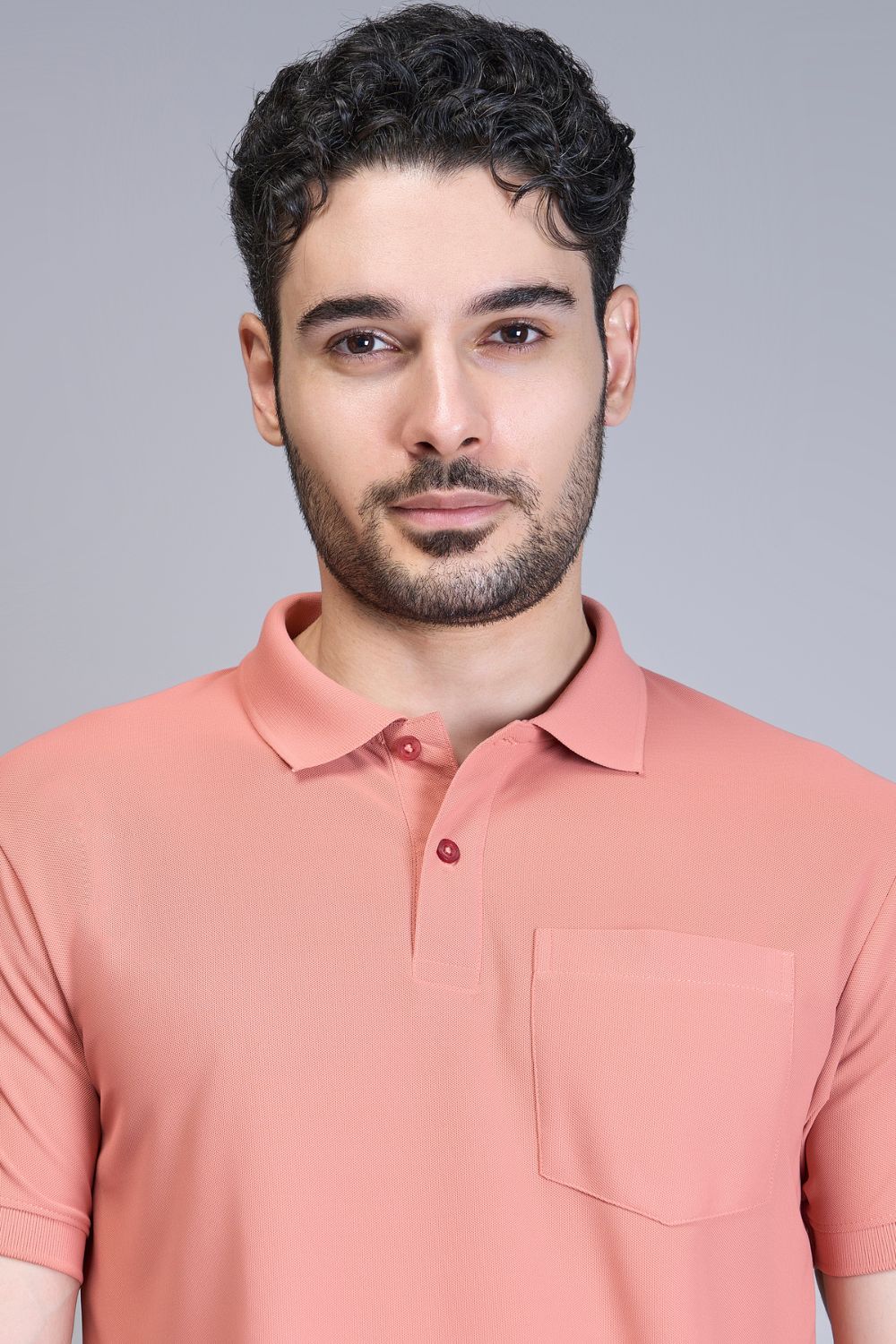 Light maroon colored, Solid T shirt for men, with half sleeves and round neck, front view.