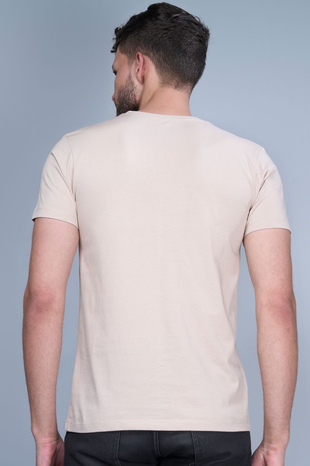 Solid T shirt for men in the color moon light with half sleeves and round neck, back view.