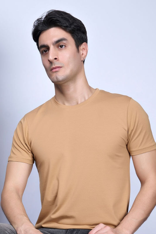 Stretch T shirt for men in the the solid color beige with half sleeves and round neck.