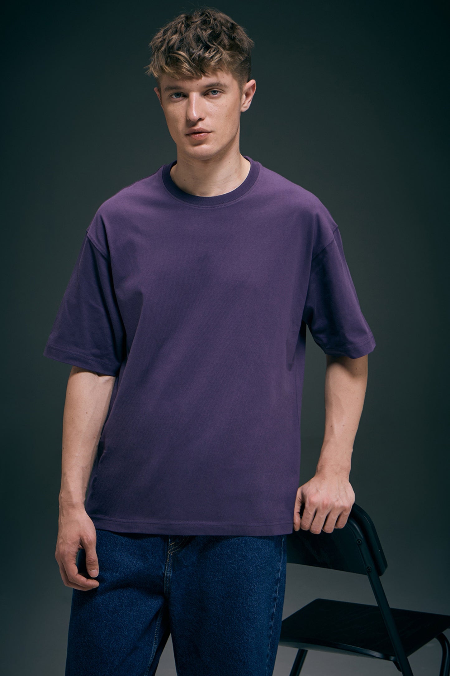 Cotton Stretch T shirt for men in the solid color lilac shade with half sleeves and round neck.