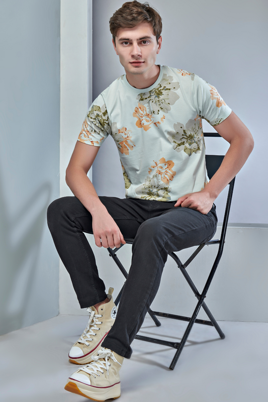 Sky light colored all over Floral print T shirt for men with half sleeves and round neck.