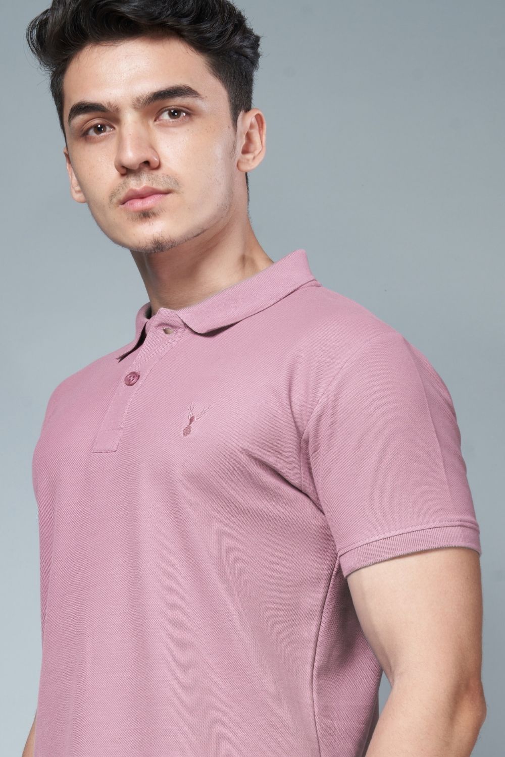 Salmon Pink colored, identity Polo T-shirts for men with collar and half sleeves.