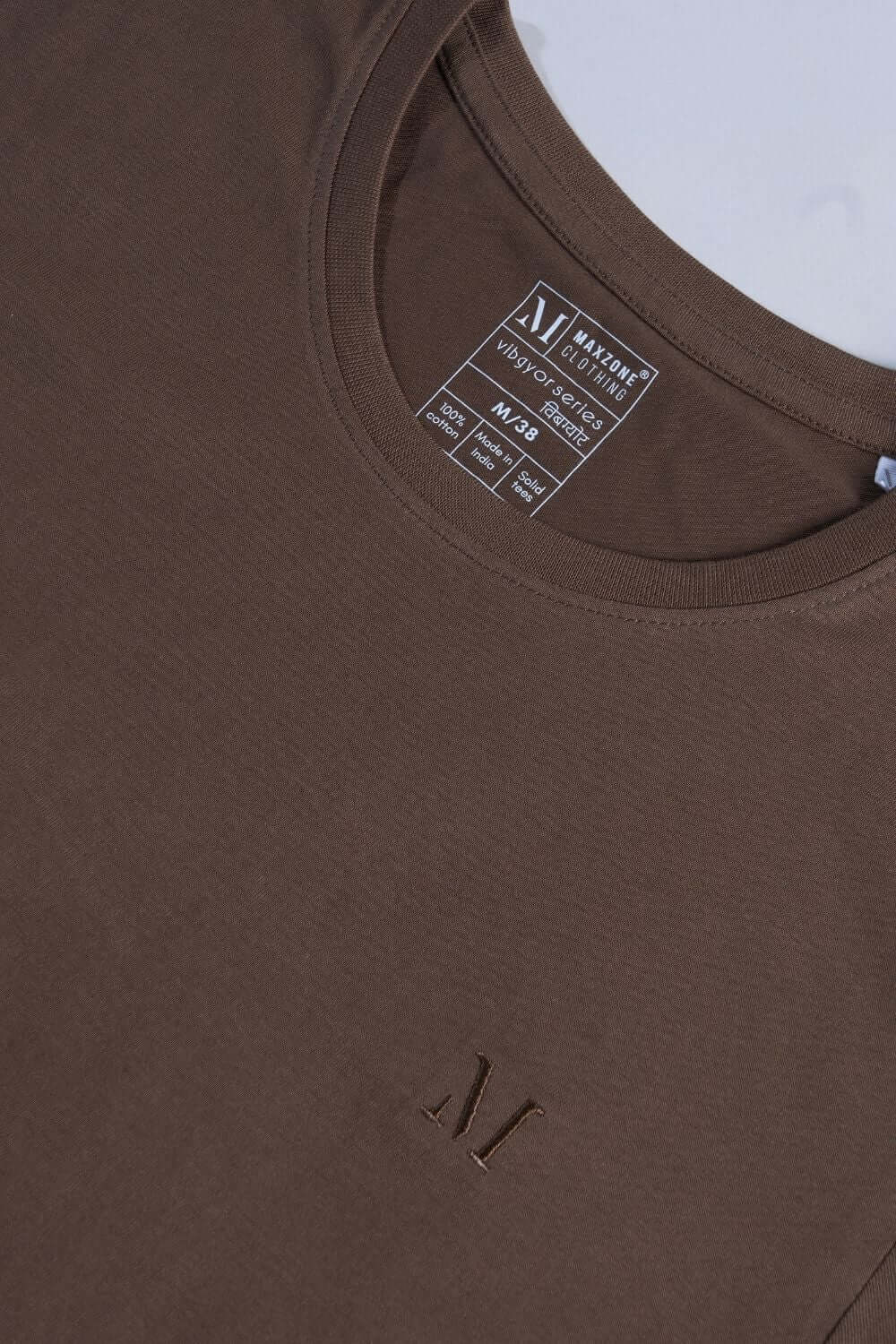 Brown colored, cotton solid T shirt for men with half sleeves and round neck from vibgyor series collection close up.