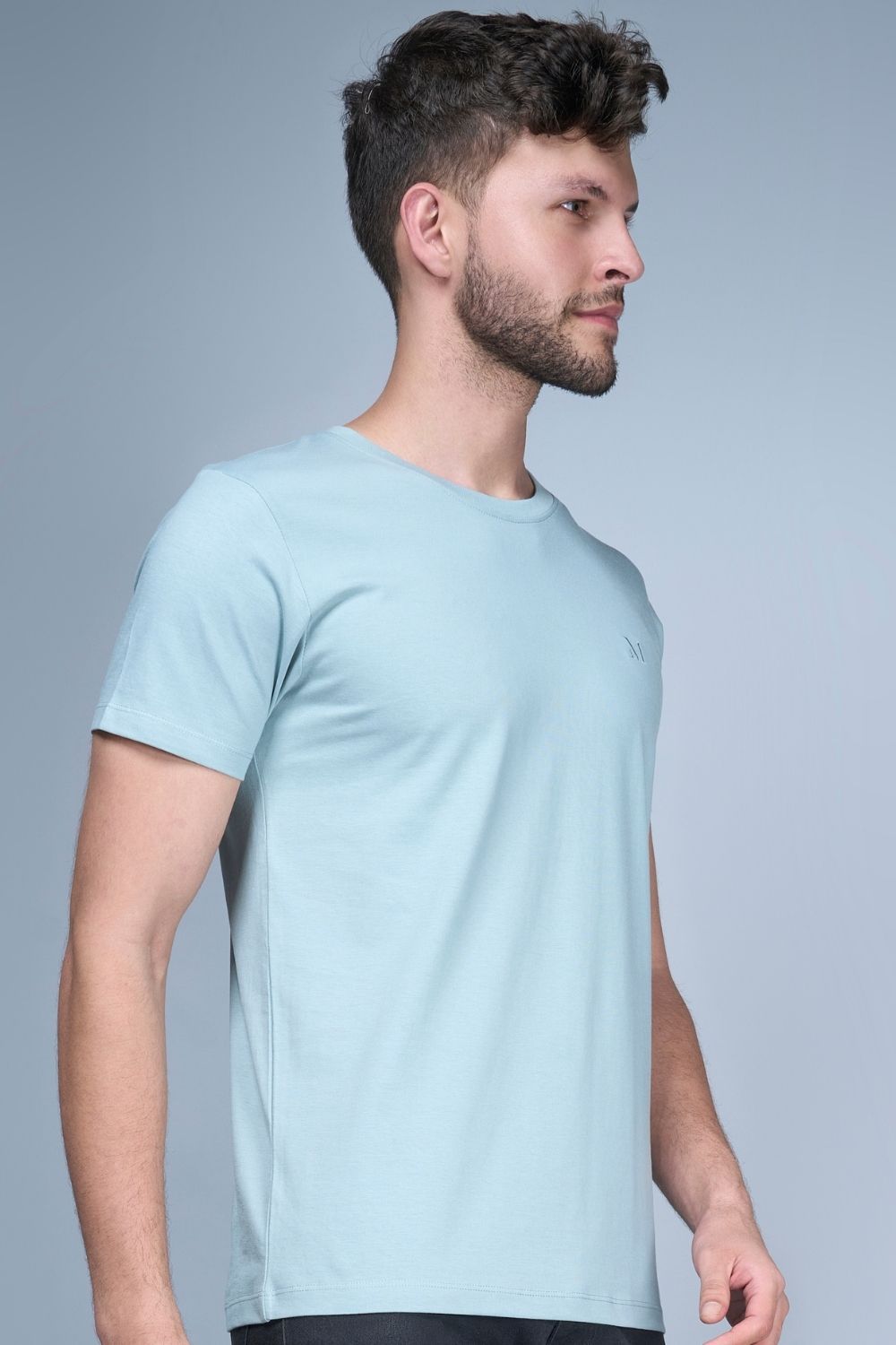 Shanghai blue colored, Solid T shirt for men, with half sleeves and round neck, side view.