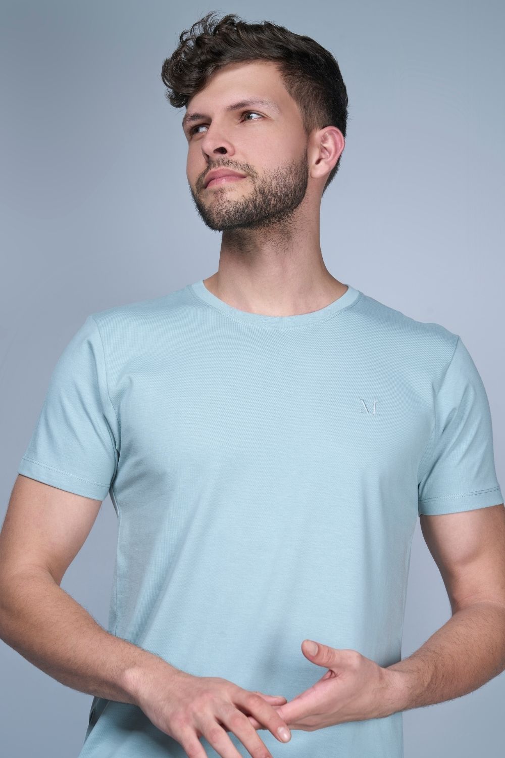 Shanghai blue colored, Solid T shirt for men, with half sleeves and round neck, close up.