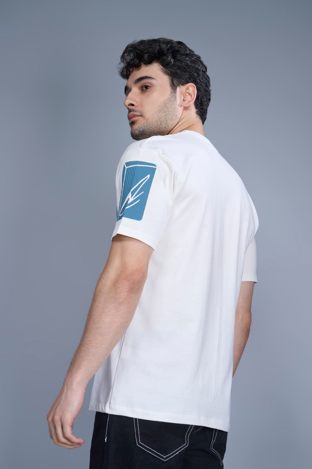 Cotton oversized T shirt for men in the solid color White with half sleeves and crew neck, back view.