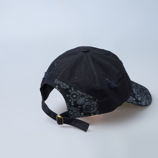 Black colored, design patterned cap for men.