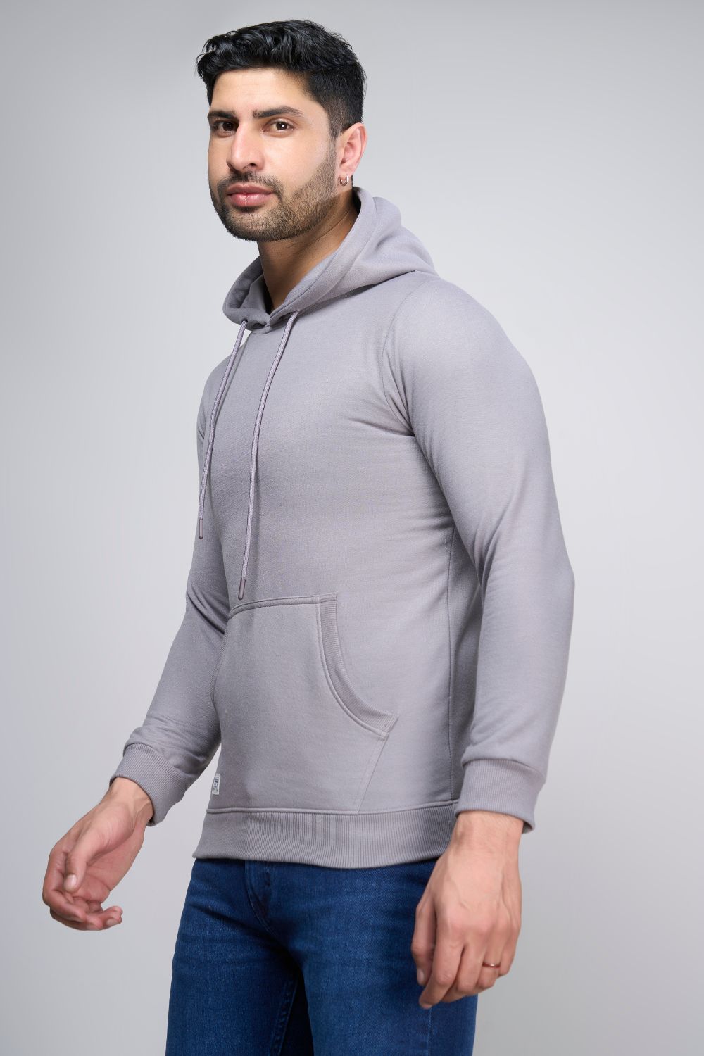 Grey Mist colored, hoodie for men with full sleeves and relaxed fit, side view.