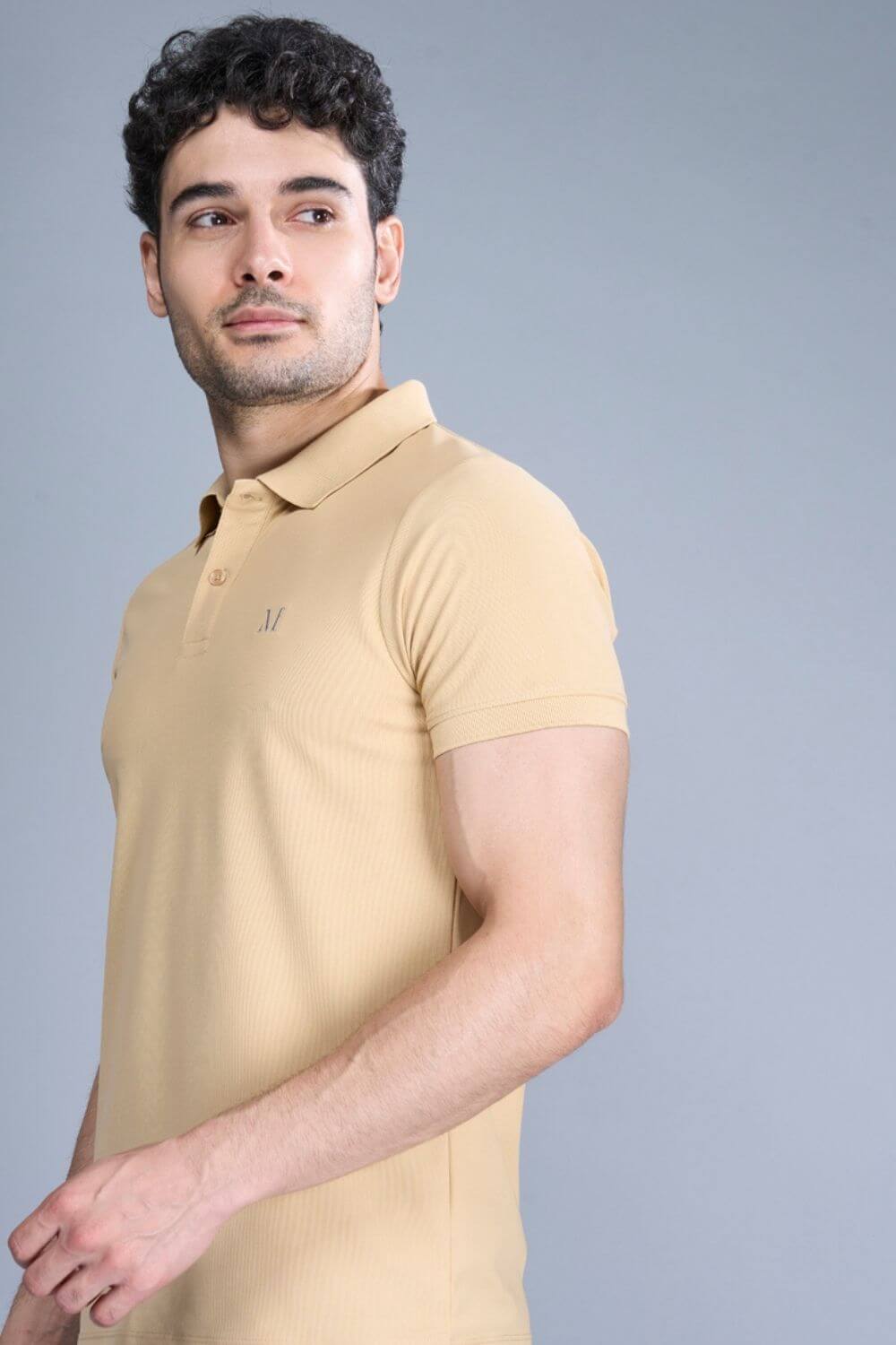 Bisque colored, Smart Tech Polo T-shirts for men with collar and half sleeves, side view.