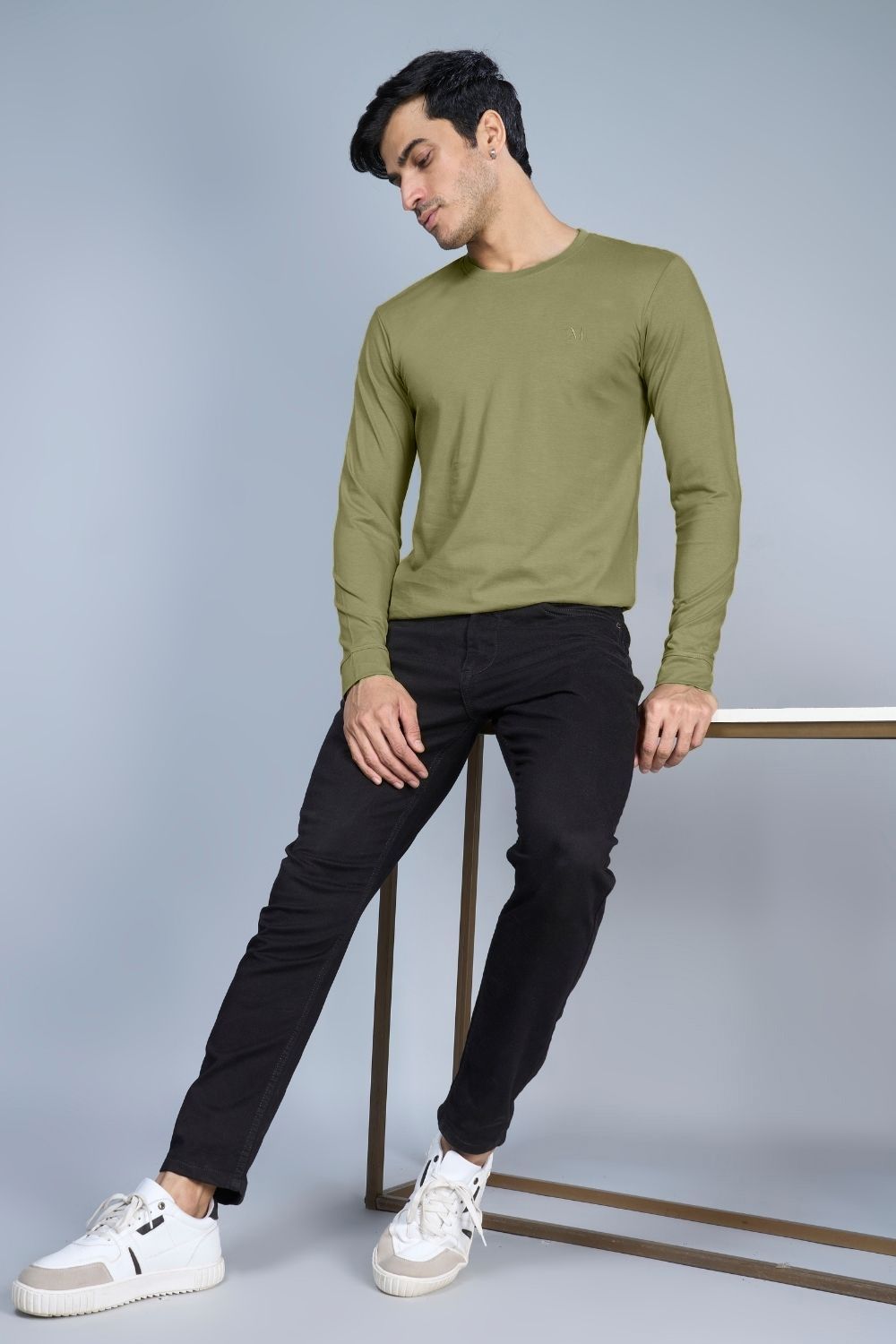 Forest green colored, full sleeve solid T shirt for Men with round neck.