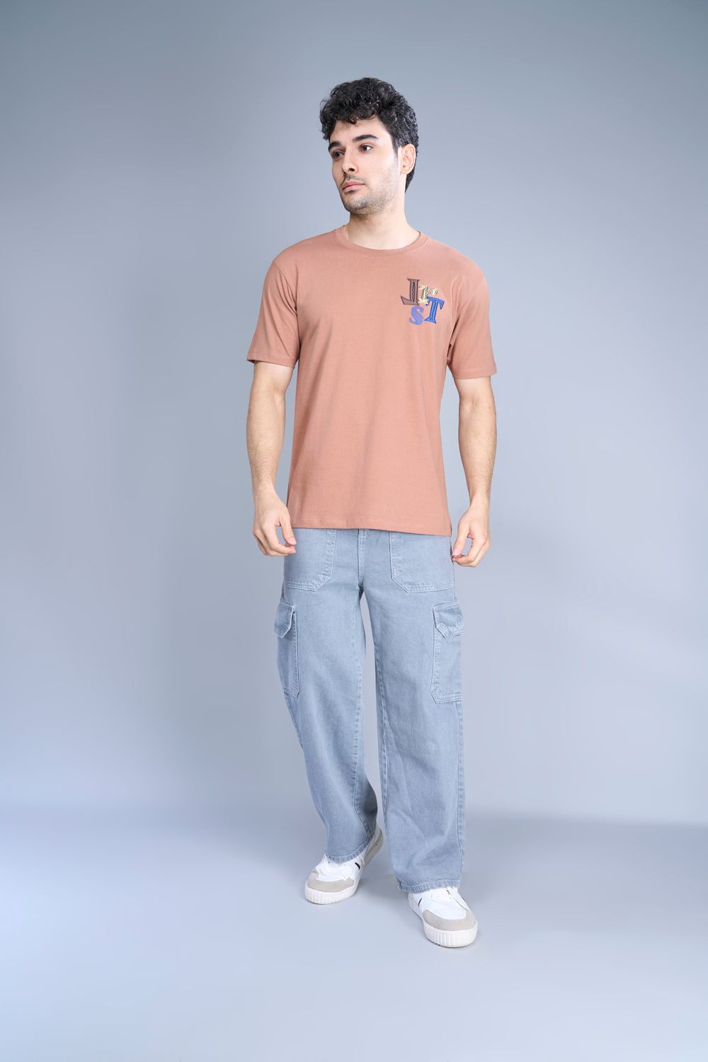 Cotton oversized T shirt for men in the solid color Café cream with half sleeves and crew neck, front view.