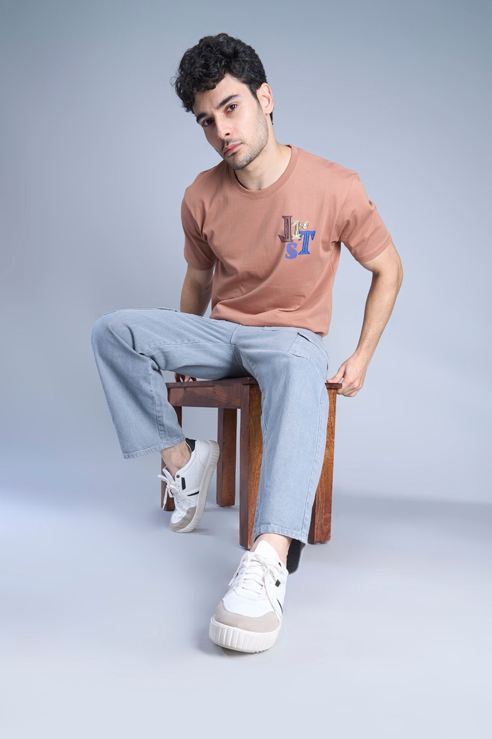 Cotton oversized T shirt for men in the solid color Café cream with half sleeves and crew neck.