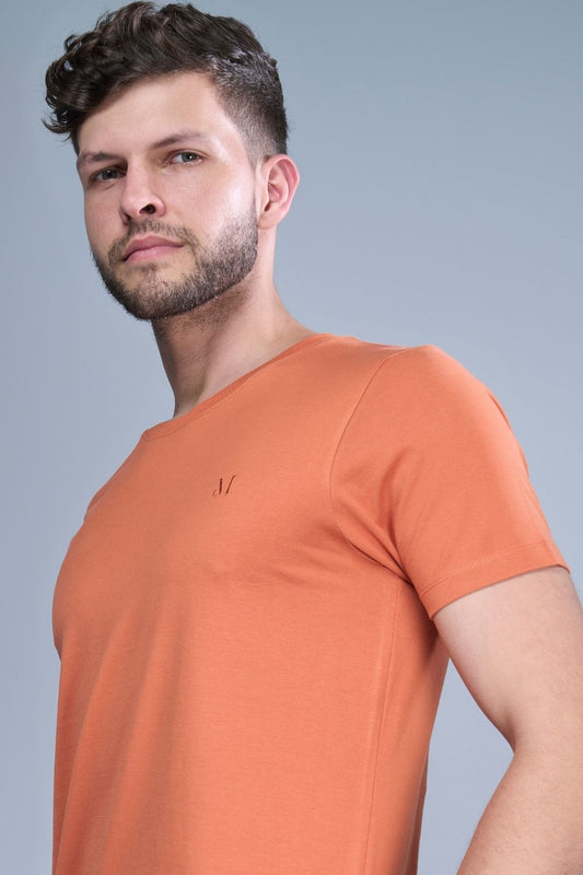 Solid T shirt for men in the color Sand stone  with half sleeves and round neck, side view.