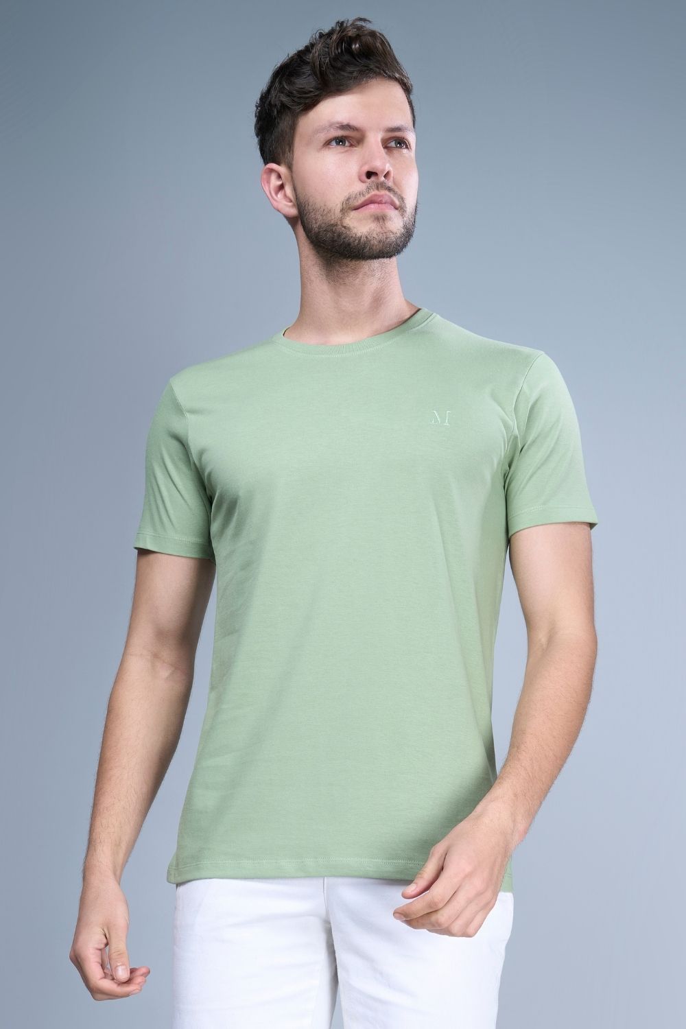Green colored, cotton Graphic T shirt for men with half sleeves and round neck, front view.