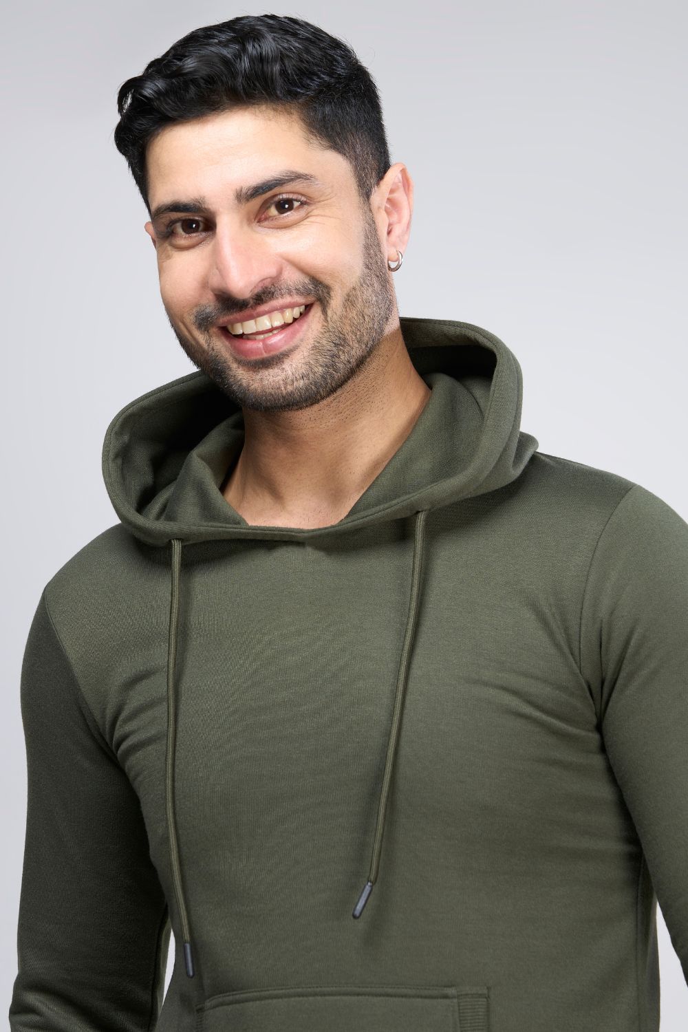 Olive colored, hoodie for men with full sleeves and relaxed fit, closeup.
