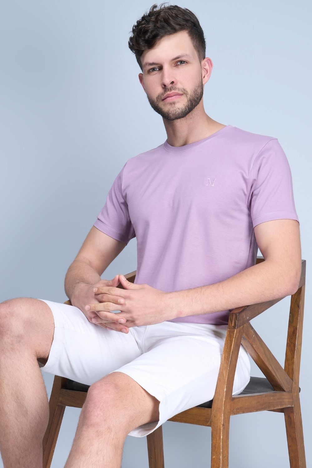 Solid T shirt for men in the color Purple  with half sleeves and round neck.