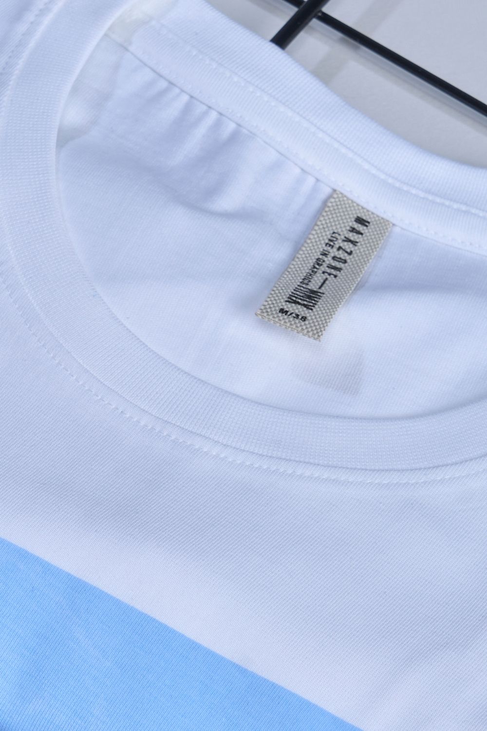 White colored, cotton Graphic inc T shirt for men, half sleeves and round neck, product close up.