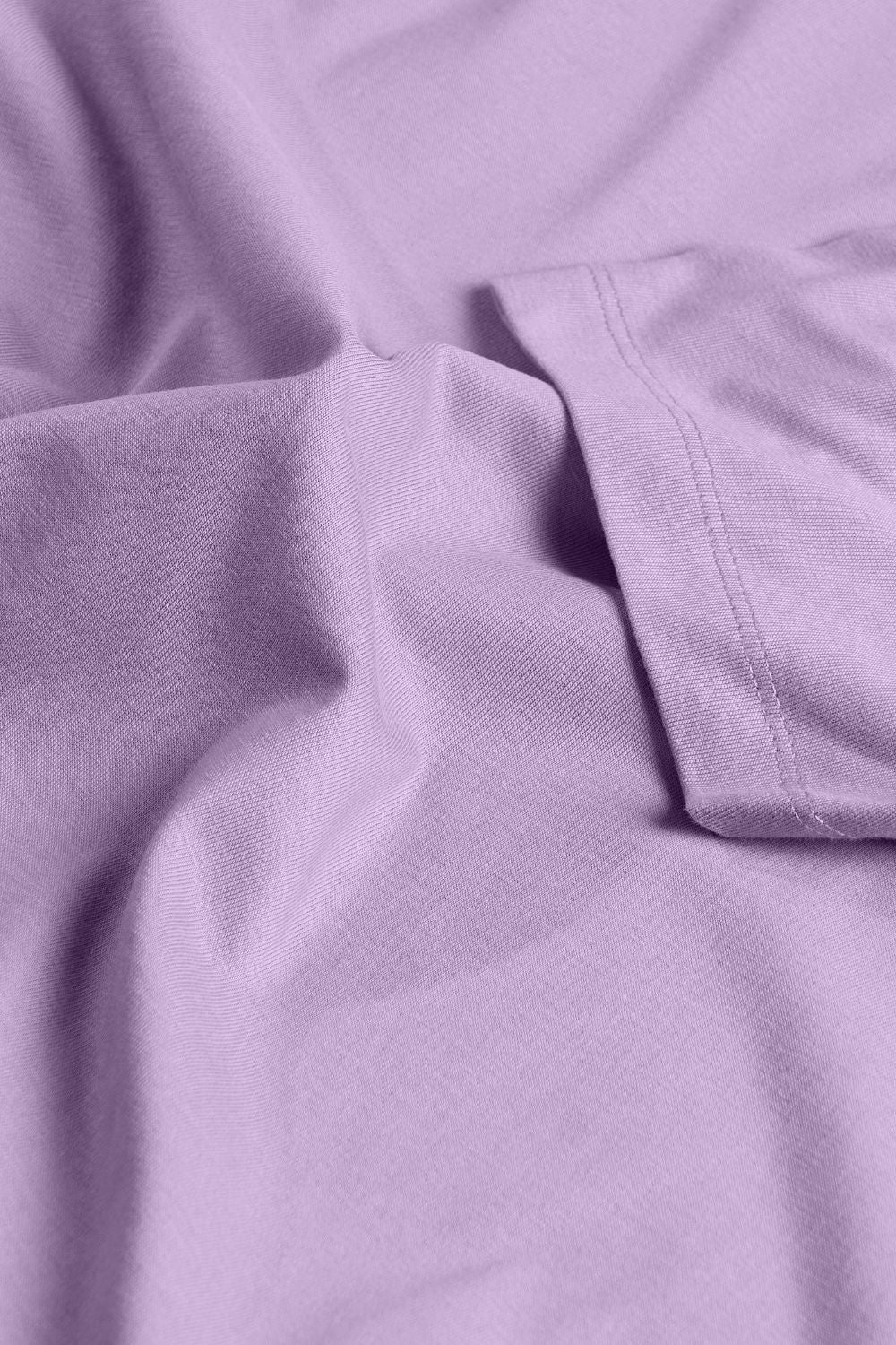 Solid T shirt for men in the color Purple  with half sleeves and round neck, fabric close up.
