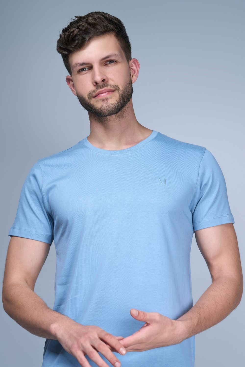 Sky Blue colored, Solid T shirt for men, with half sleeves and round neck.