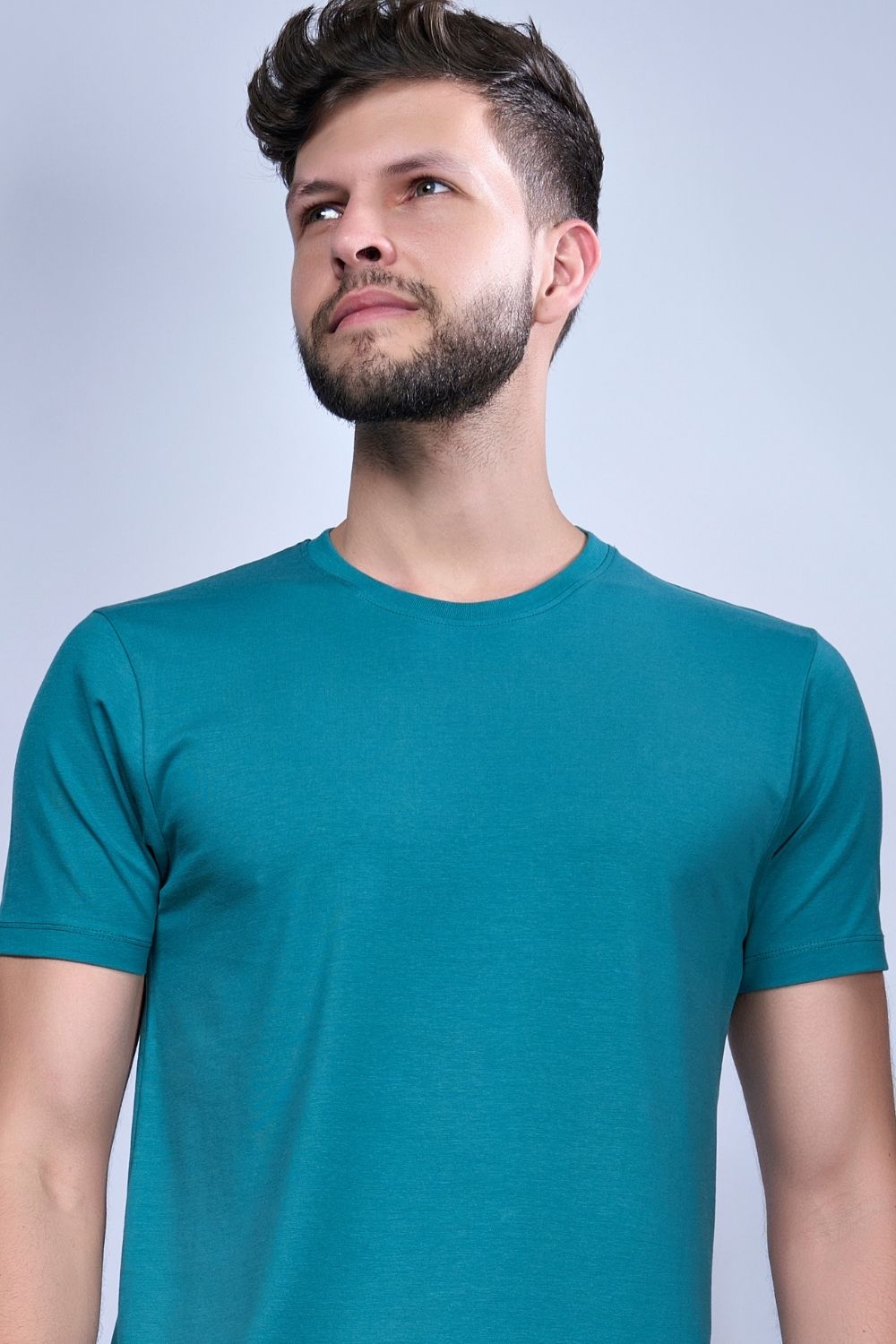 Cotton Stretch T shirt for men in the the solid color British Green with half sleeves and round neck, front view.