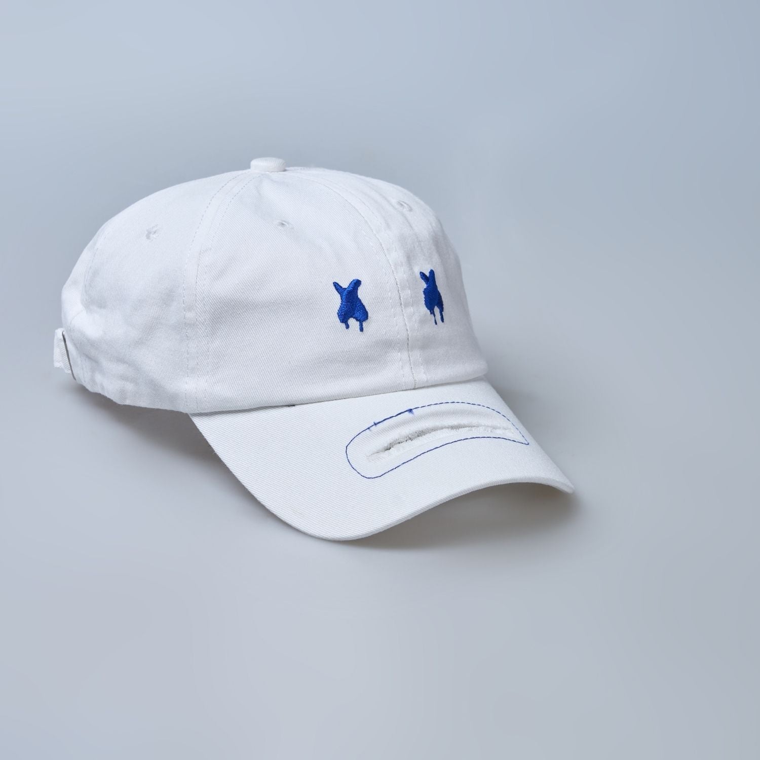 white colored, solid cap for men.