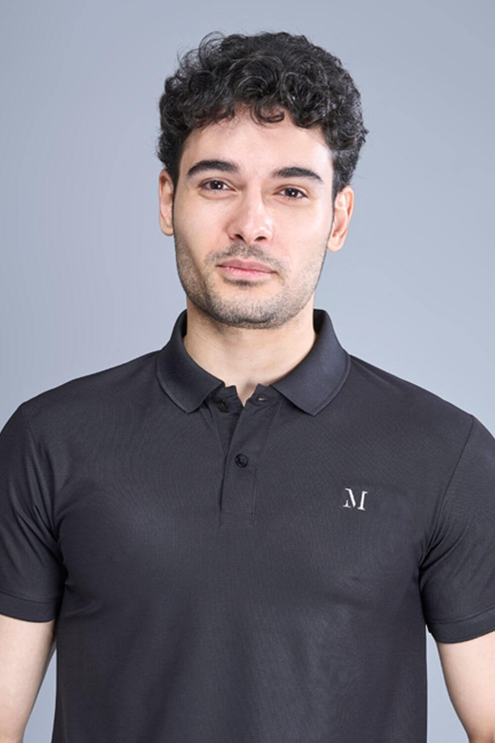 Black colored, Smart Tech Polo T-shirts for men with collar and half sleeves, front view.