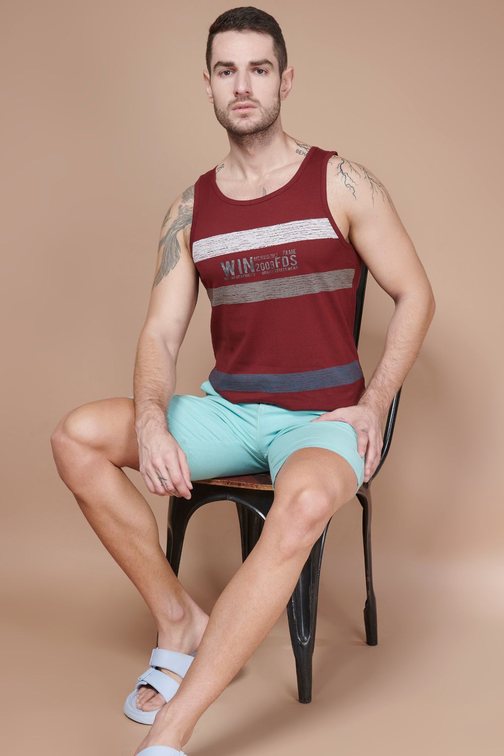 Maroon colored cotton Sleeveless Printed Tank Tees for men.