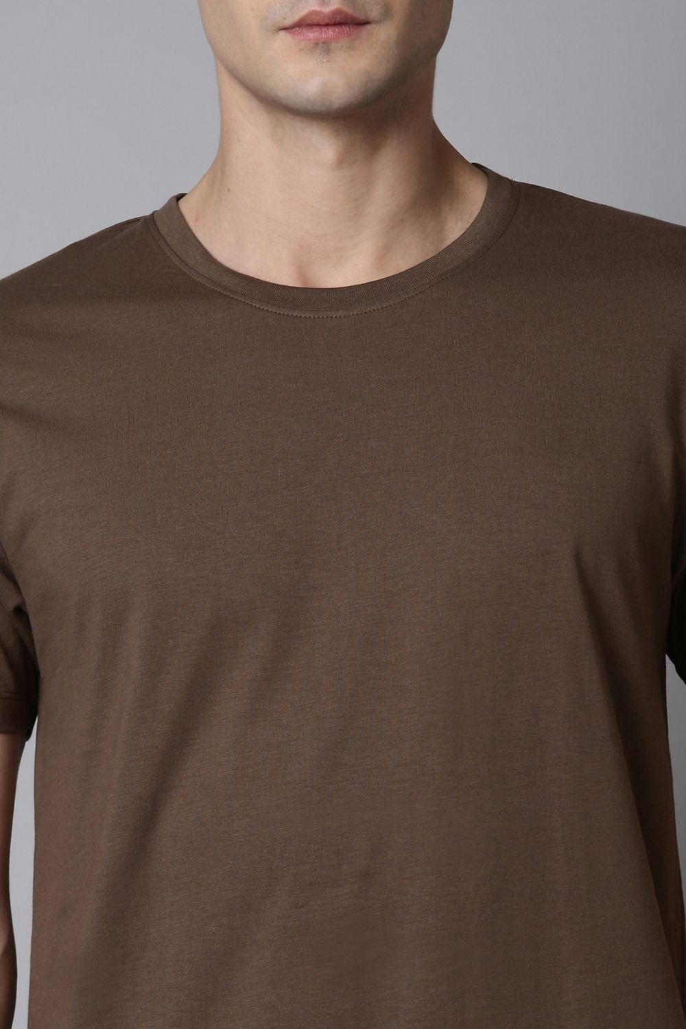 Coin grey colored, solid t shirt for men with round neck and half sleeves, product feature.