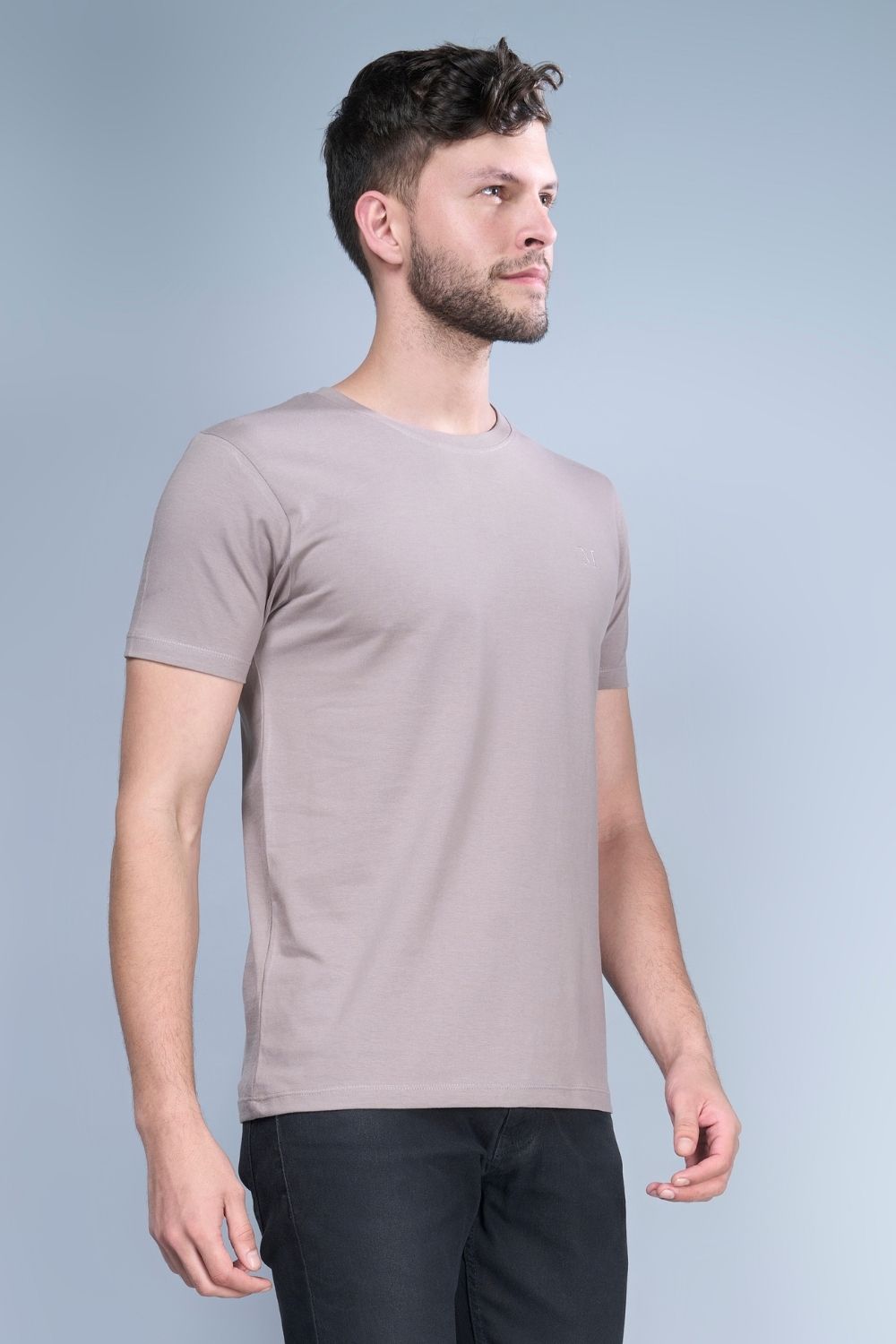 Coin grey colored, solid t shirt for men with round neck and half sleeves, side view.