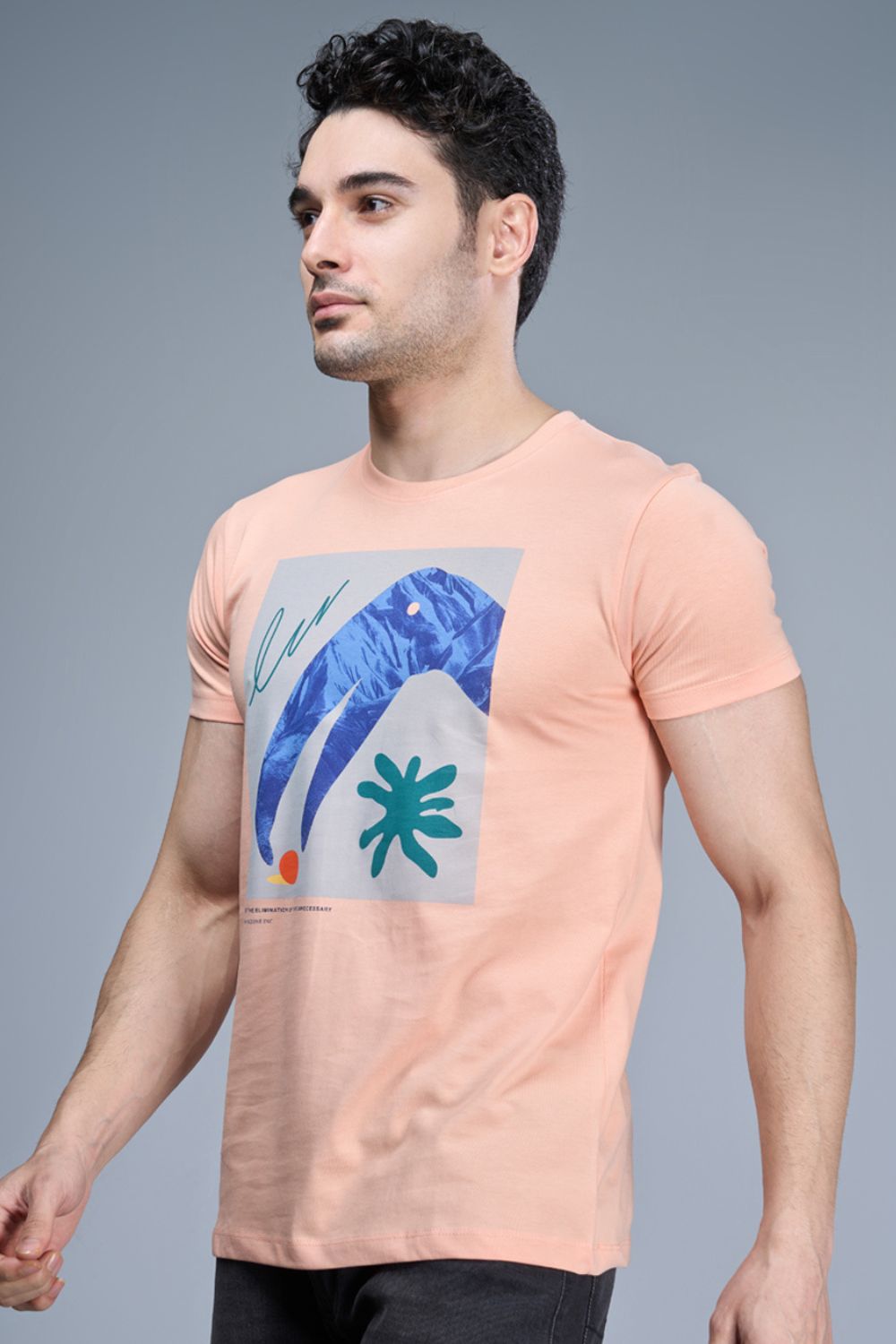 Peach colored, cotton Graphic T shirt for men, half sleeves and round neck, side view.