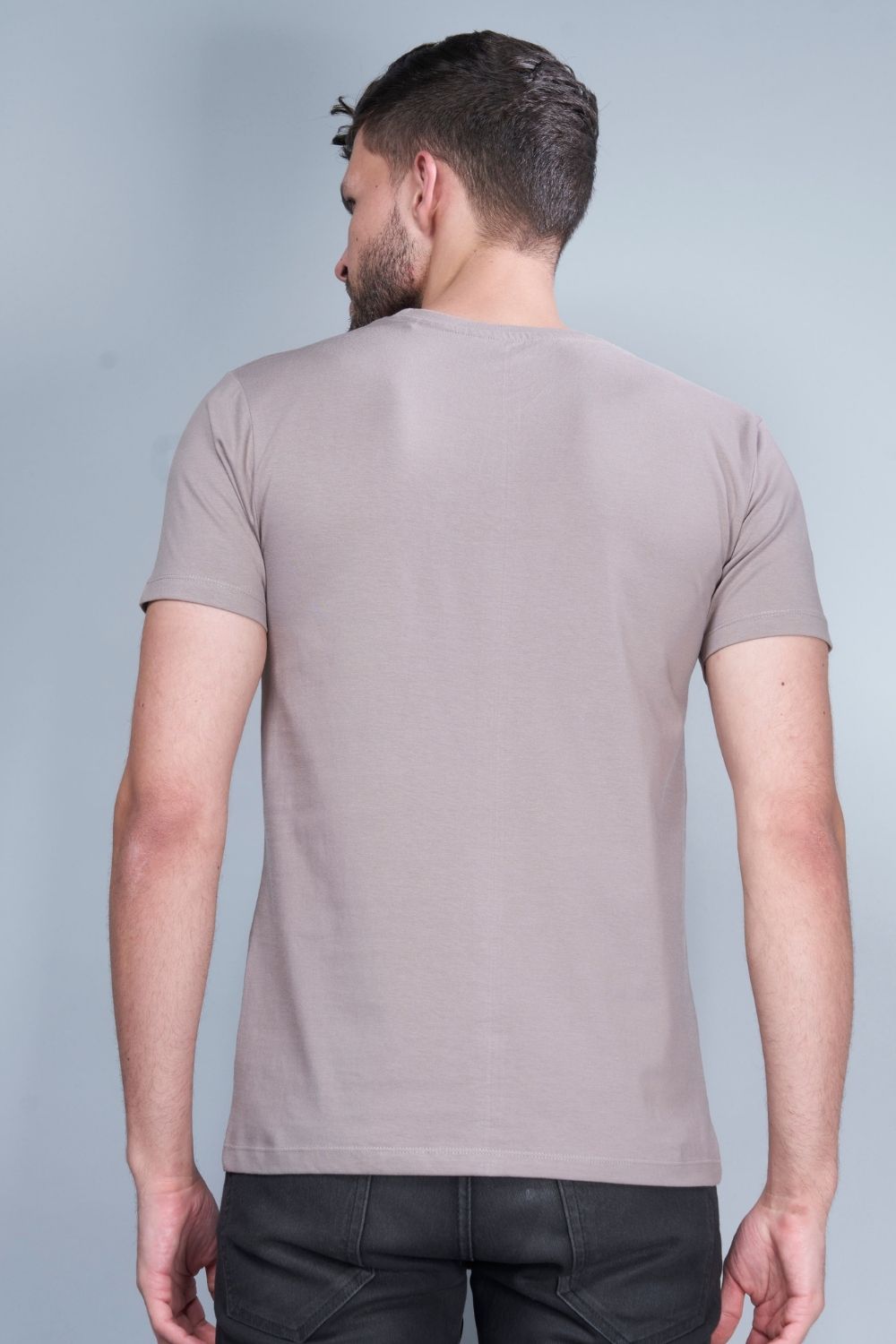 Coin grey colored, solid t shirt for men with round neck and half sleeves, back view.