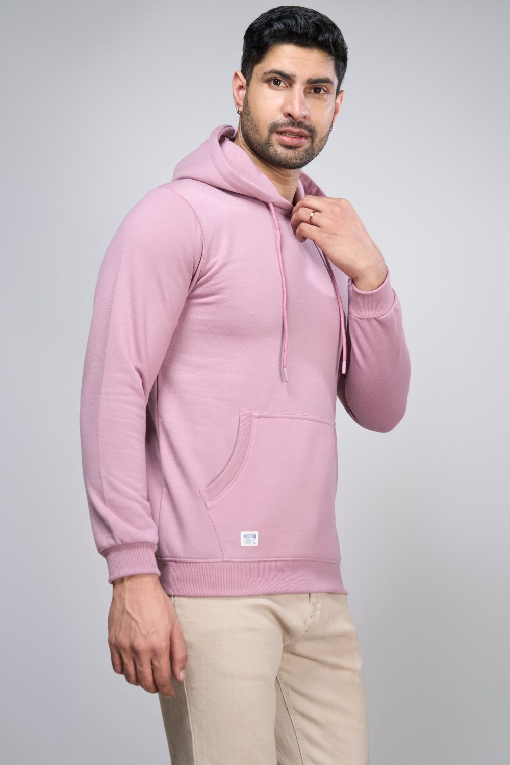 Rich Lilac colored, hoodie for men with full sleeves and relaxed fit, side view.