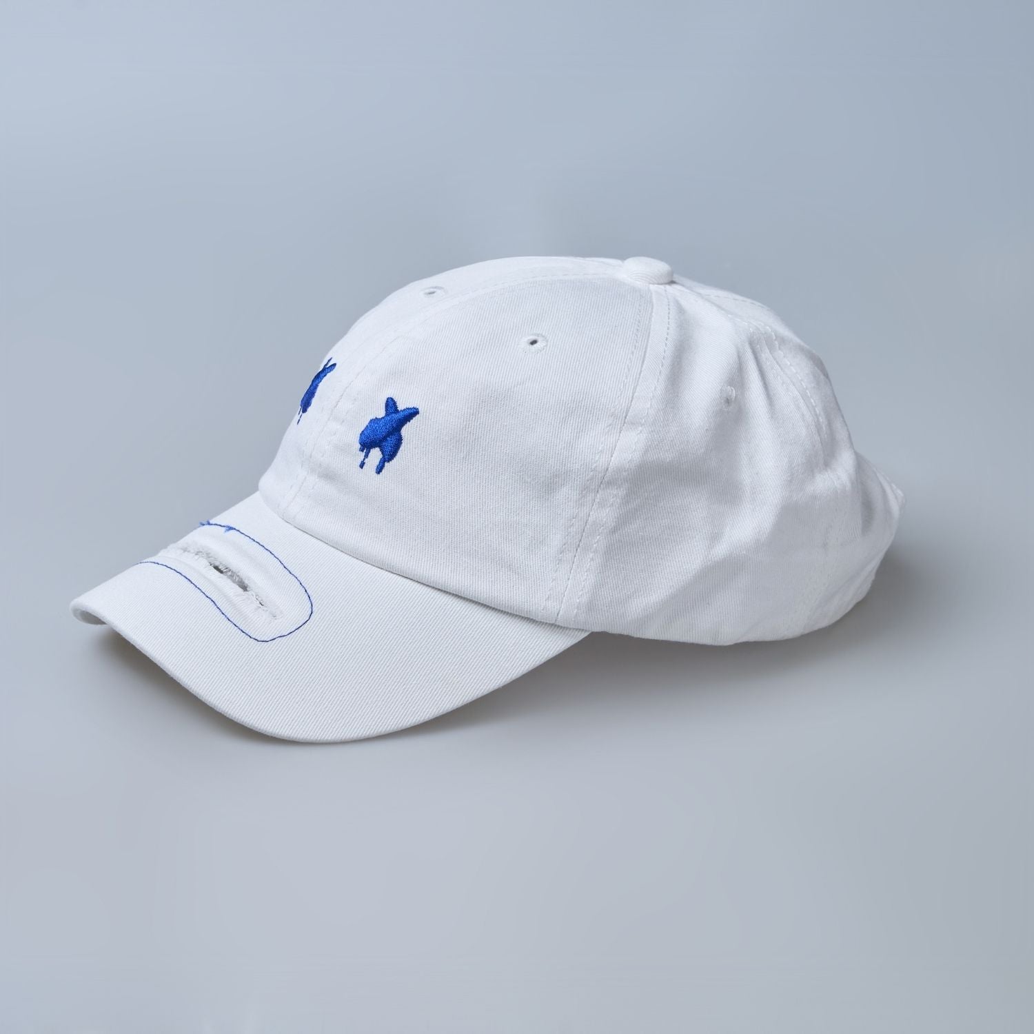 white colored, wide brim cap for men with adjustable strap, design details.