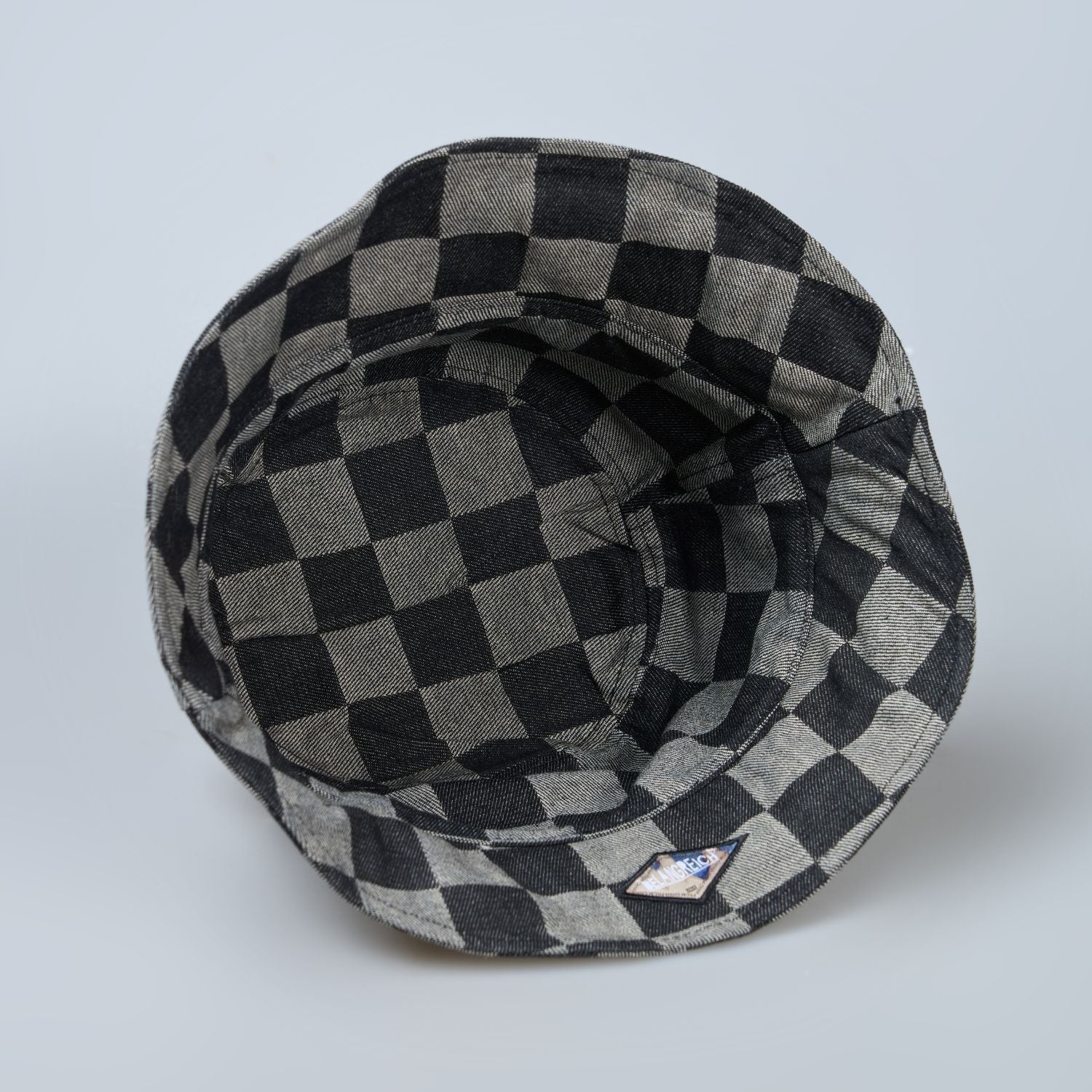 Black colored, chequered pattern, lightweight bucket hat for men, inside view.