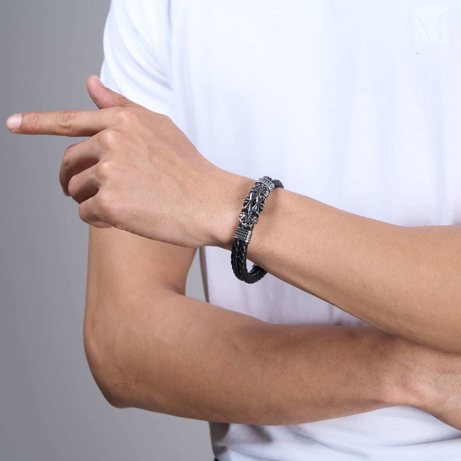 Display of Black and Silver colored Bracelet for men with magnetic clasp on a hand.