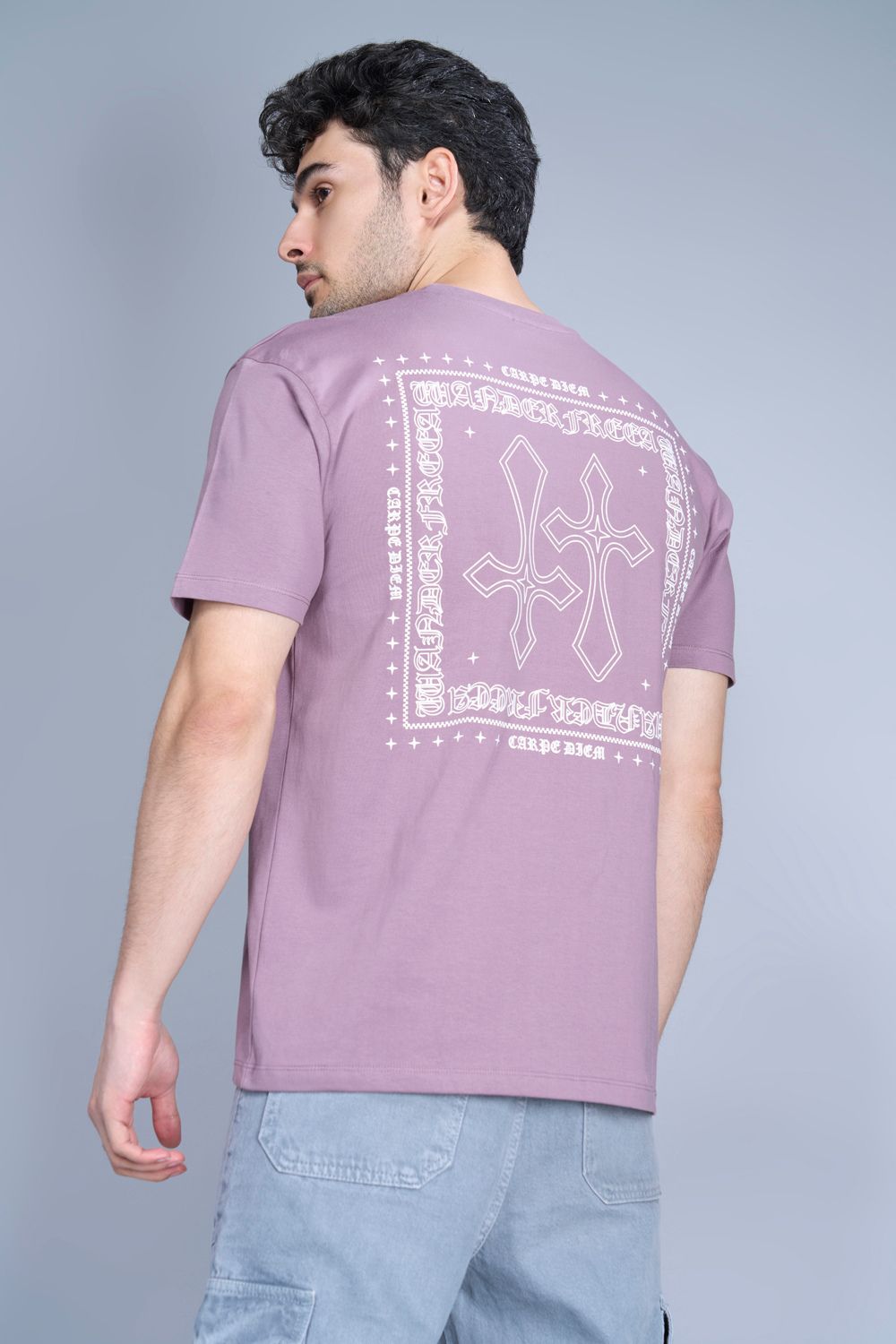 Cotton oversized T shirt for men in the solid color Opera Mauve with half sleeves and crew neck, back view.