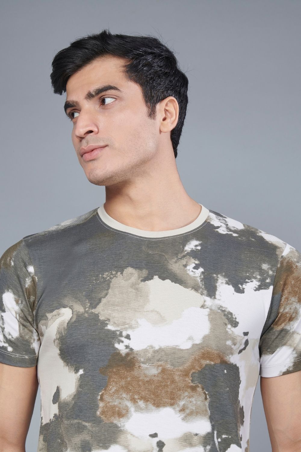 Close up of Stone colored, all over print T shirt for men with half sleeves and round neck.