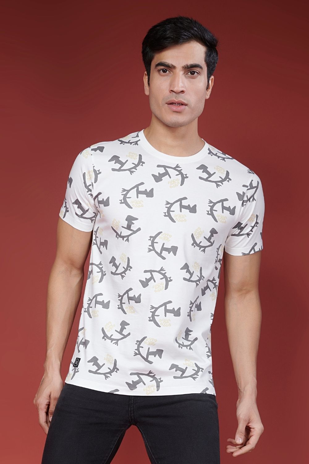 Front view of white colored all over print T shirt for men with short sleeves and round neck.