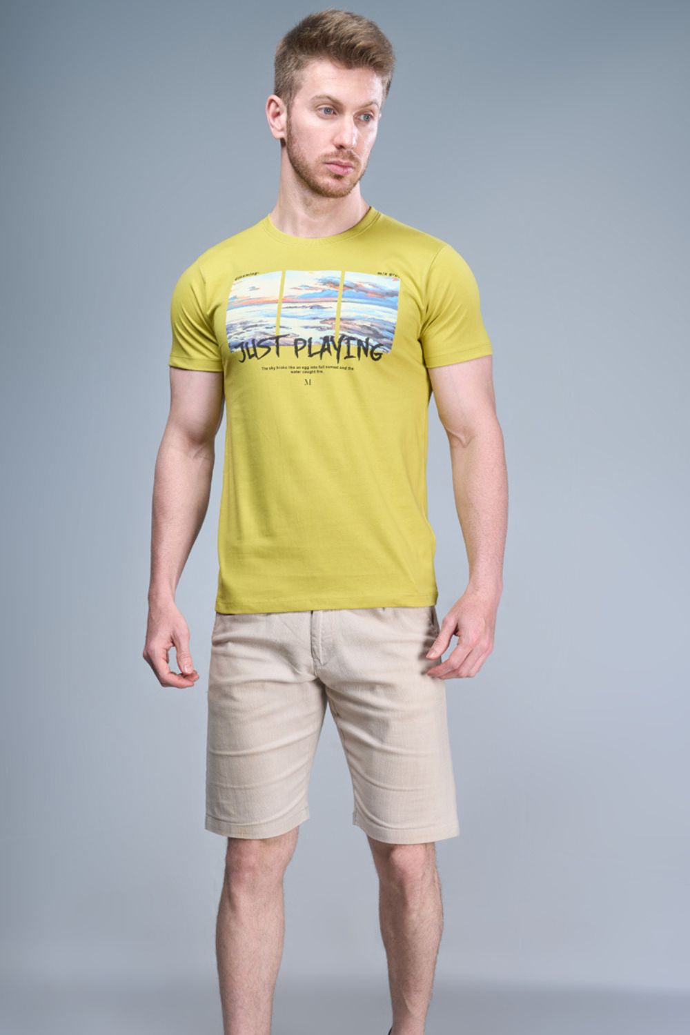 Yellow colored, cotton Graphic T shirt for men, half sleeves and round neck, front view.