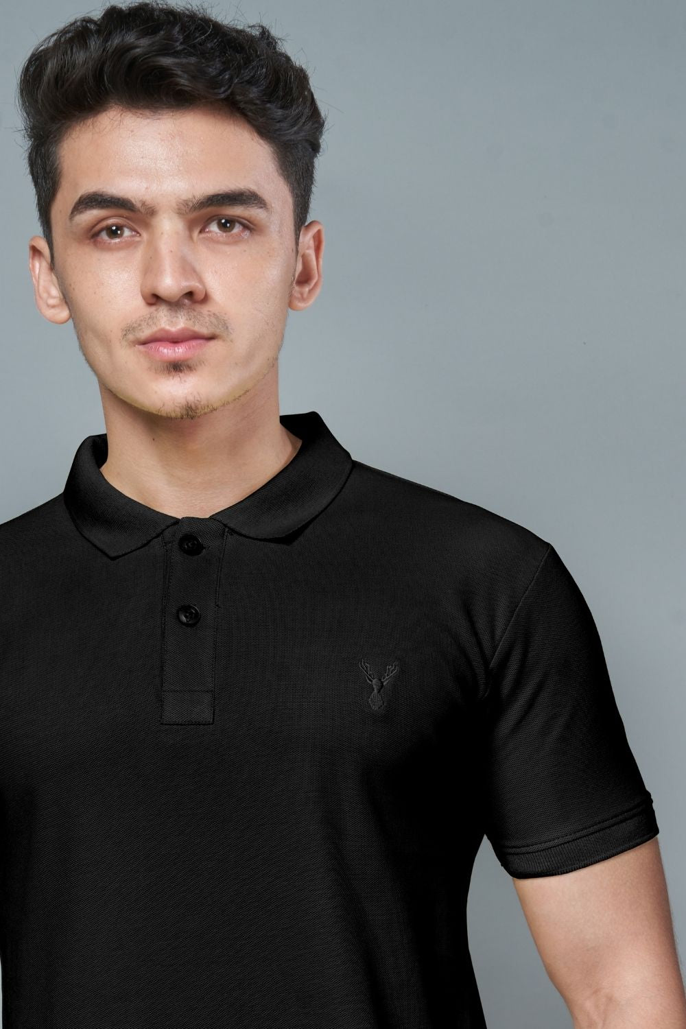 Black colored, identity Polo T-shirts for men with collar and half sleeves, close up.