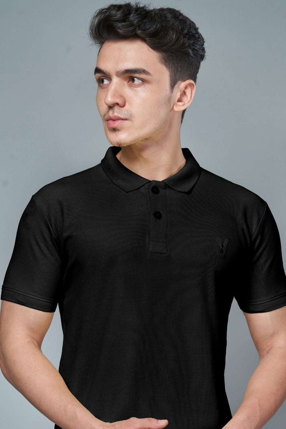 Black colored, identity Polo T-shirts for men with collar and half sleeves, front view.
