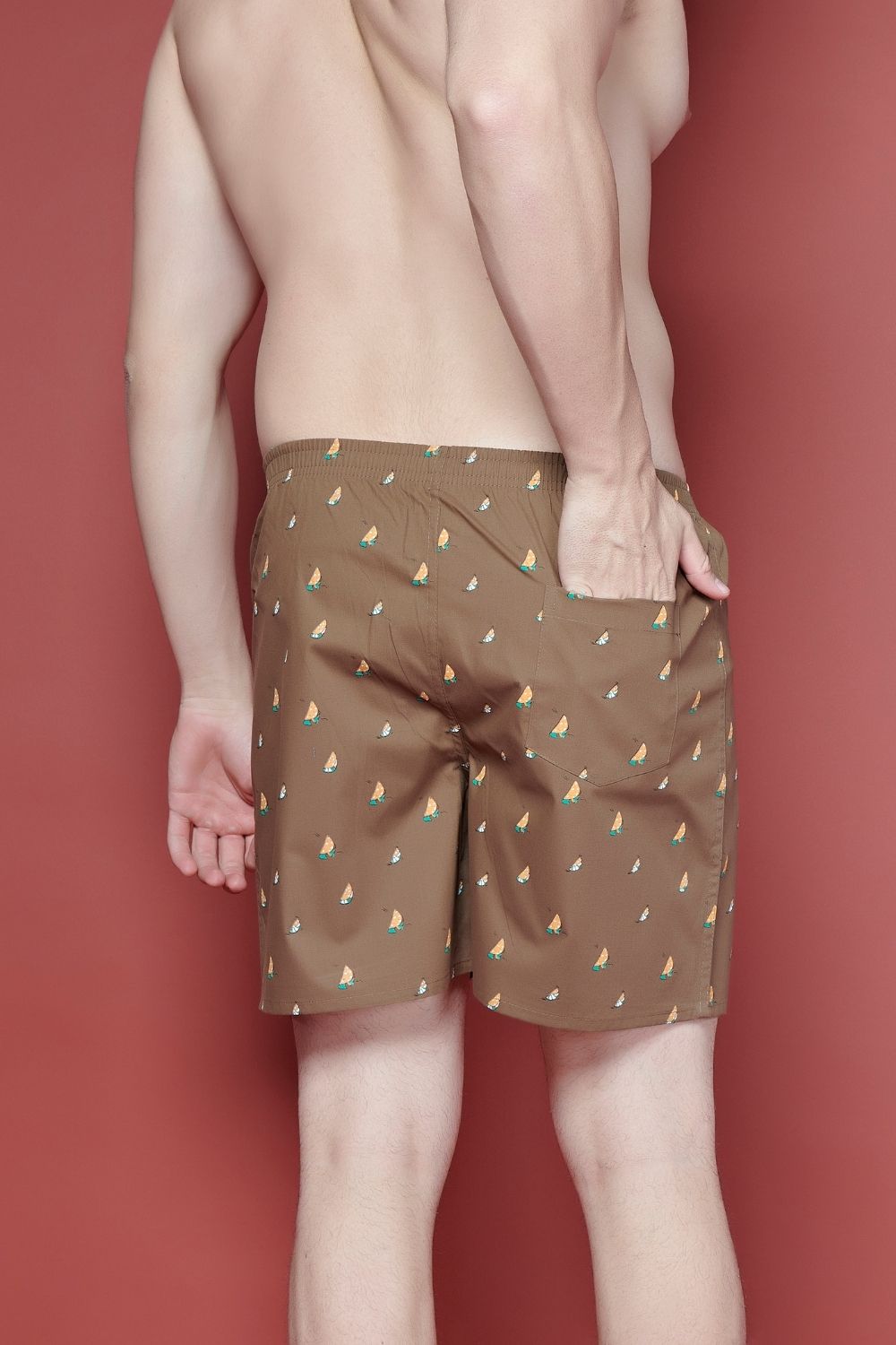 coffee colored all over printed cotton boxer for men with back pockets, back.